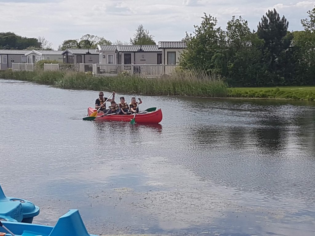 family in a canoe